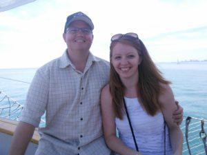 Jordan and Amber Disch photo with the ocean as background